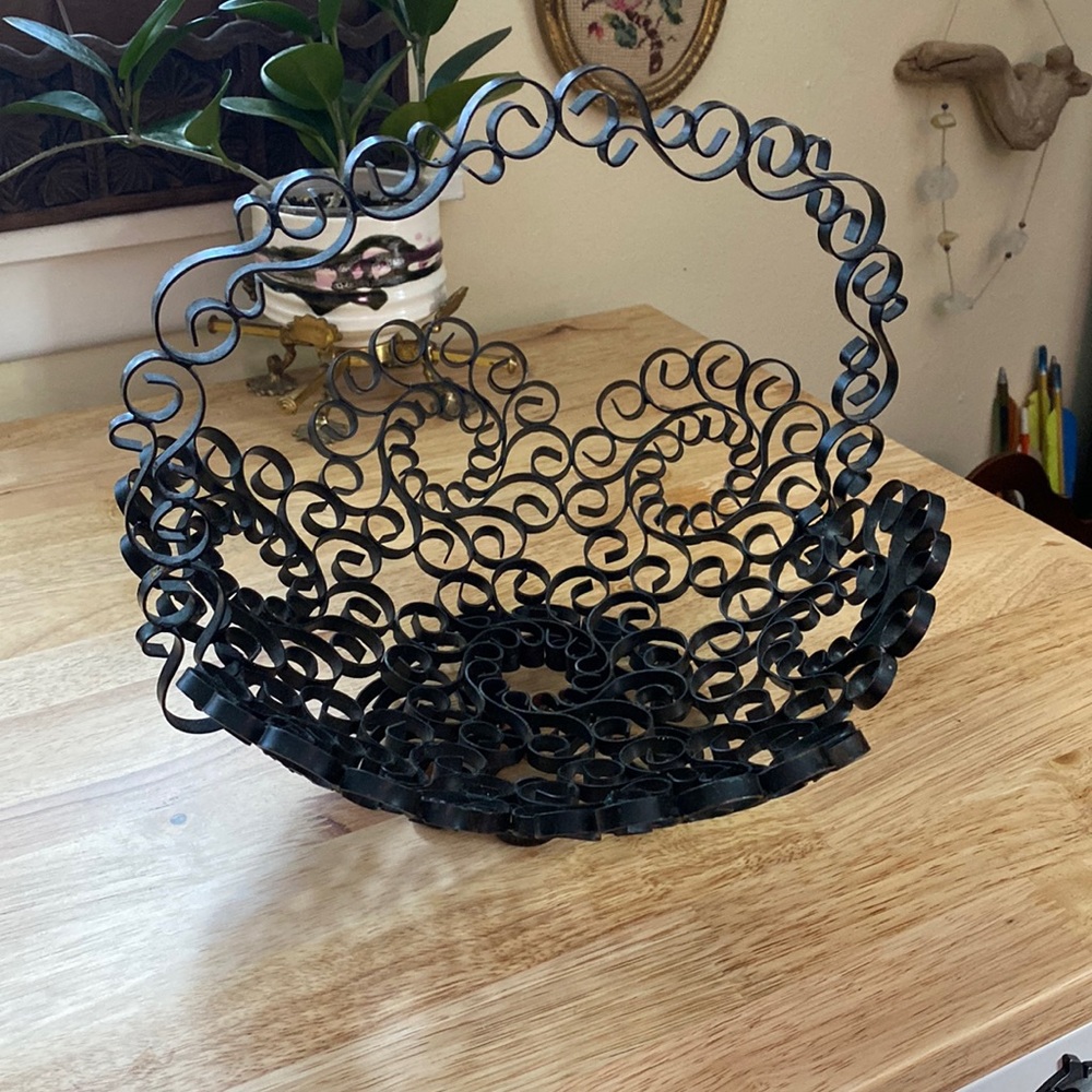Beautiful ornate vintage wrought iron basket-